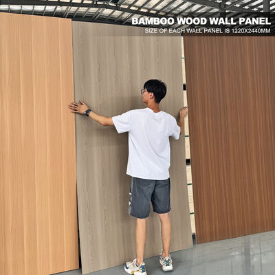 Modern Bamboo Charcoal Wood Veneer Indoor Decorative PVC Wood Grain Wear Resistant Wall Panel Cladding For Home And Hotel